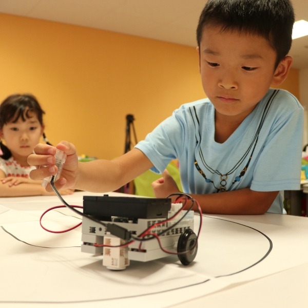Children control robot